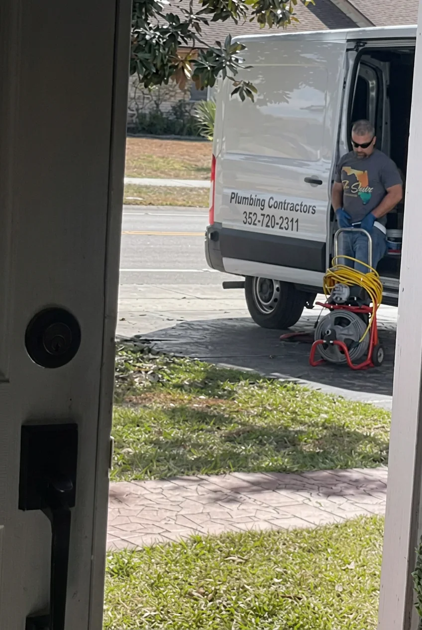 Flo State van with a drain machine on a service call
